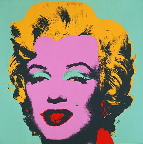 A silkscreen image of Marilyn Monroe. Her hair is deep yellow, and her skin is bubblegum pink. Her lips and neck are highlighted in bright red, and her sky blue eyeshadow complements the mint colored background.